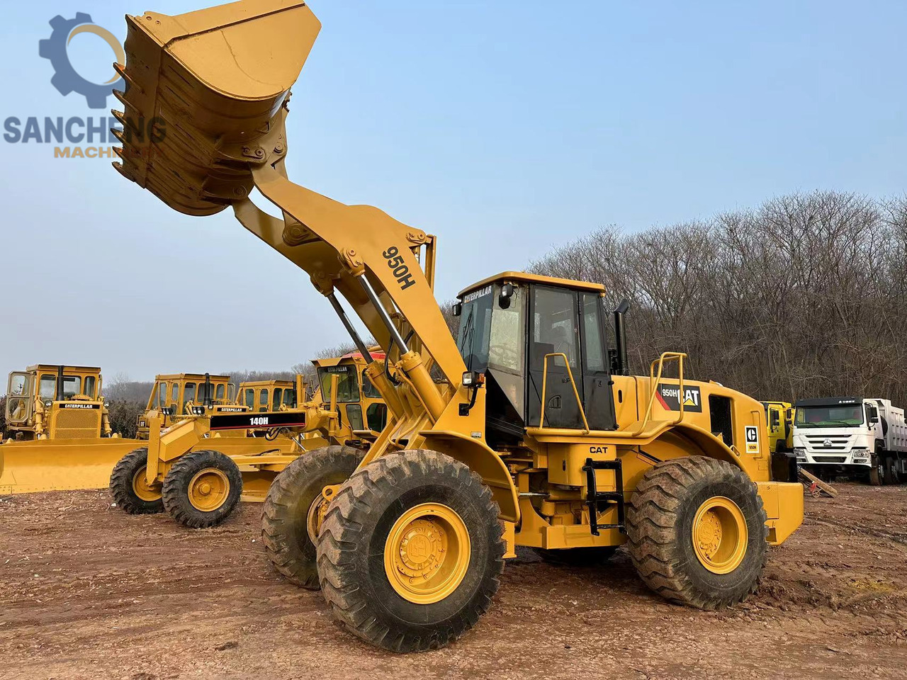 CATERPILLAR 950H - Gumikerekes homlokrakodó: 4 kép. CATERPILLAR 950H - Gumikerekes homlokrakodó: 4 kép.