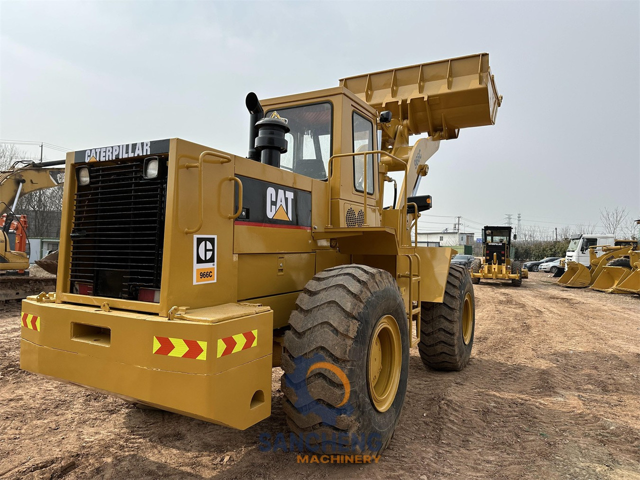 CATERPILLAR 966C - Gumikerekes homlokrakodó: 5 kép. CATERPILLAR 966C - Gumikerekes homlokrakodó: 5 kép.