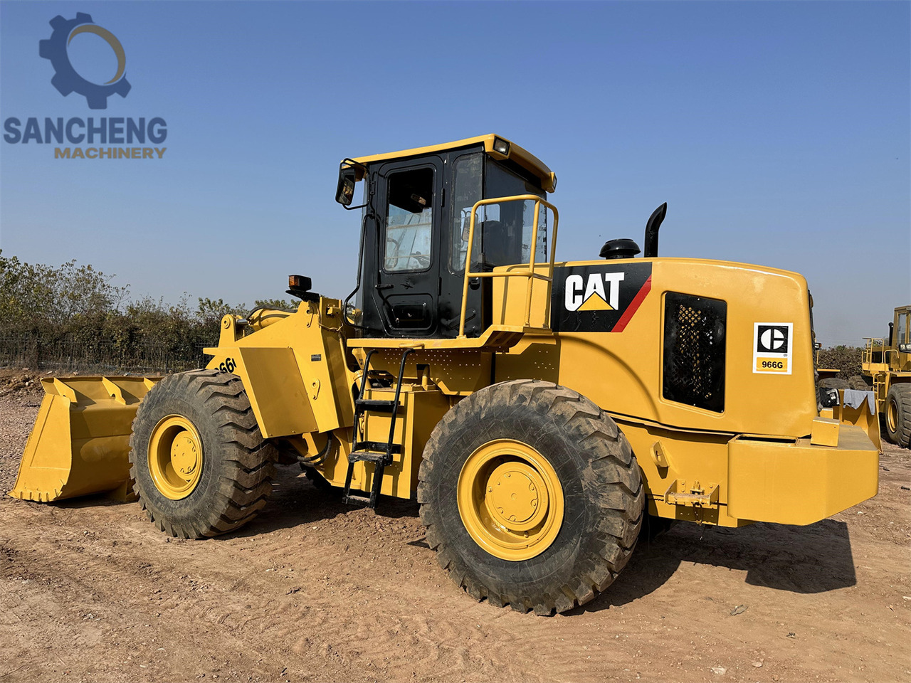 CATERPILLAR 966G - Gumikerekes homlokrakodó: 4 kép. CATERPILLAR 966G - Gumikerekes homlokrakodó: 4 kép.