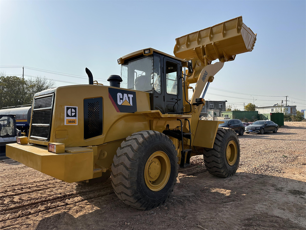 CATERPILLAR 966G - Gumikerekes homlokrakodó: 4 kép. CATERPILLAR 966G - Gumikerekes homlokrakodó: 4 kép.