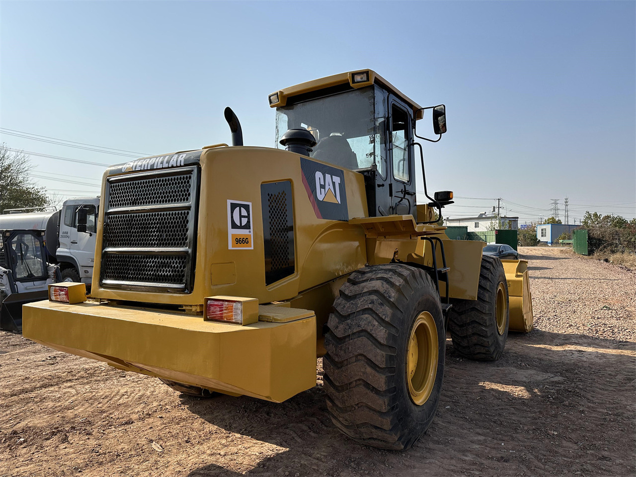 CATERPILLAR 966G - Gumikerekes homlokrakodó: 5 kép. CATERPILLAR 966G - Gumikerekes homlokrakodó: 5 kép.