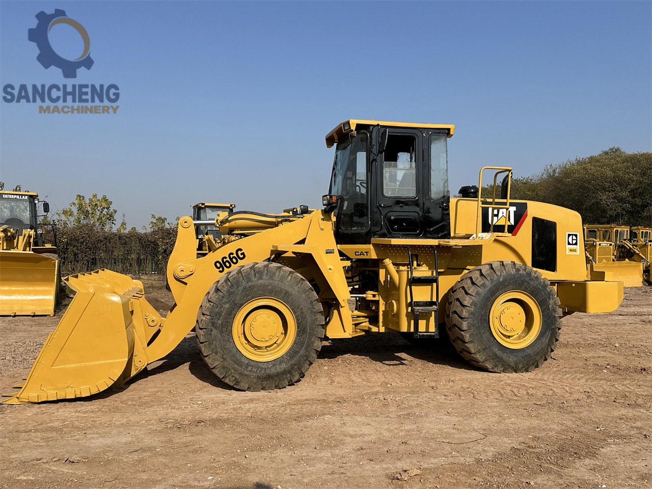 CATERPILLAR 966G - Gumikerekes homlokrakodó: 1 kép. CATERPILLAR 966G - Gumikerekes homlokrakodó: 1 kép.
