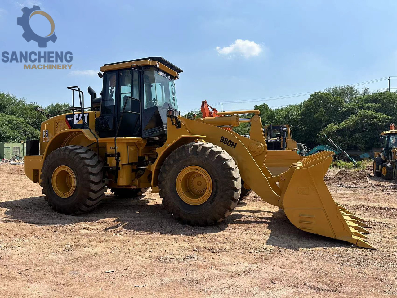 CATERPILLAR 980H - Gumikerekes homlokrakodó: 4 kép. CATERPILLAR 980H - Gumikerekes homlokrakodó: 4 kép.