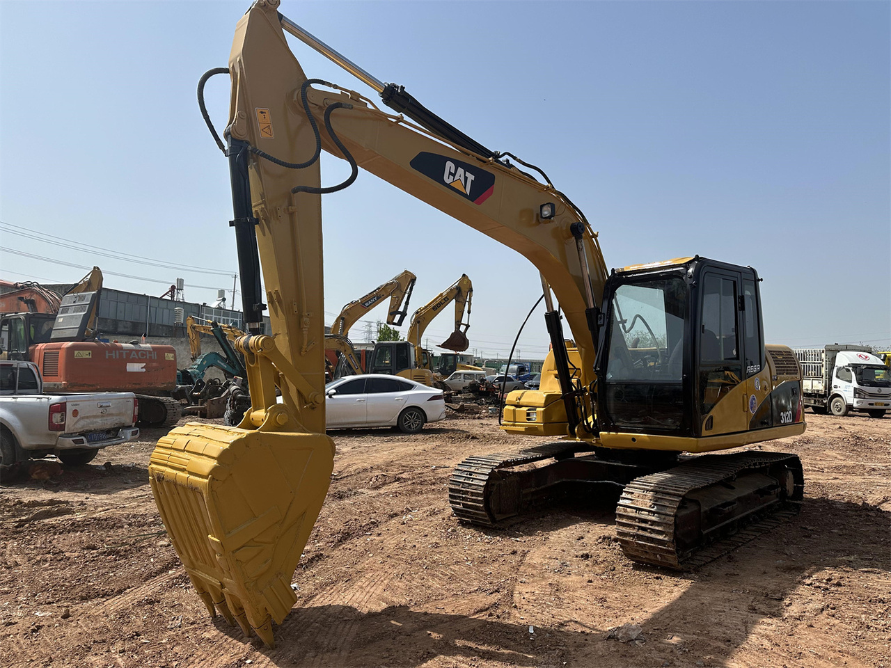 Caterpillar 312D - Minikotró: 3 kép. Caterpillar 312D - Minikotró: 3 kép.