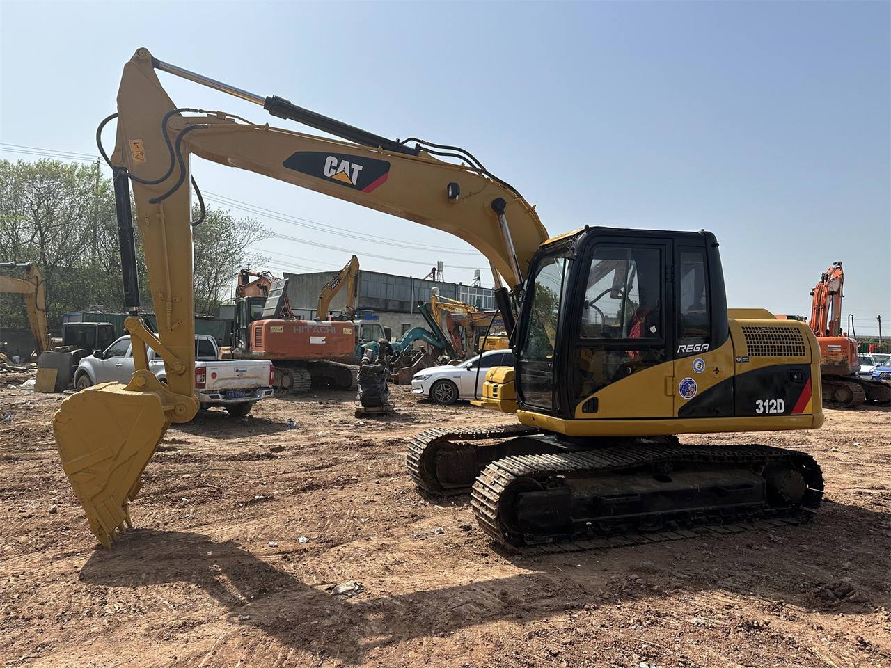 Caterpillar 312D - Minikotró: 4 kép. Caterpillar 312D - Minikotró: 4 kép.