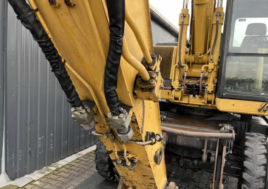 Gumikerekes kotró CAT Lift Trucks M315: 7 kép.