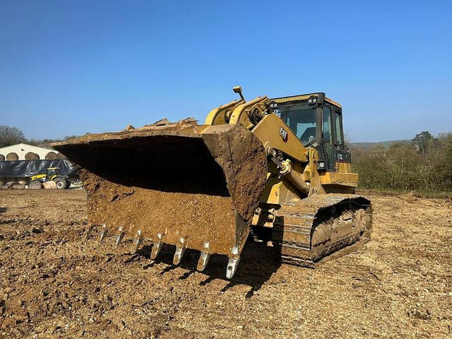 Caterpillar 973C - - Rakodógép: 1 kép. Caterpillar 973C - - Rakodógép: 1 kép.