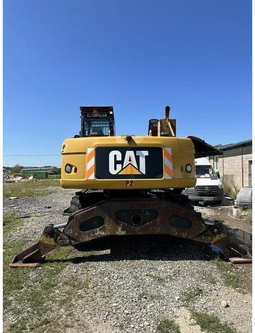 Caterpillar M322D VAH - Kotrógép: 3 kép. Caterpillar M322D VAH - Kotrógép: 3 kép.
