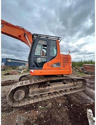 Doosan DX235LCR - - Kotrógép: 3 kép. Doosan DX235LCR - - Kotrógép: 3 kép.