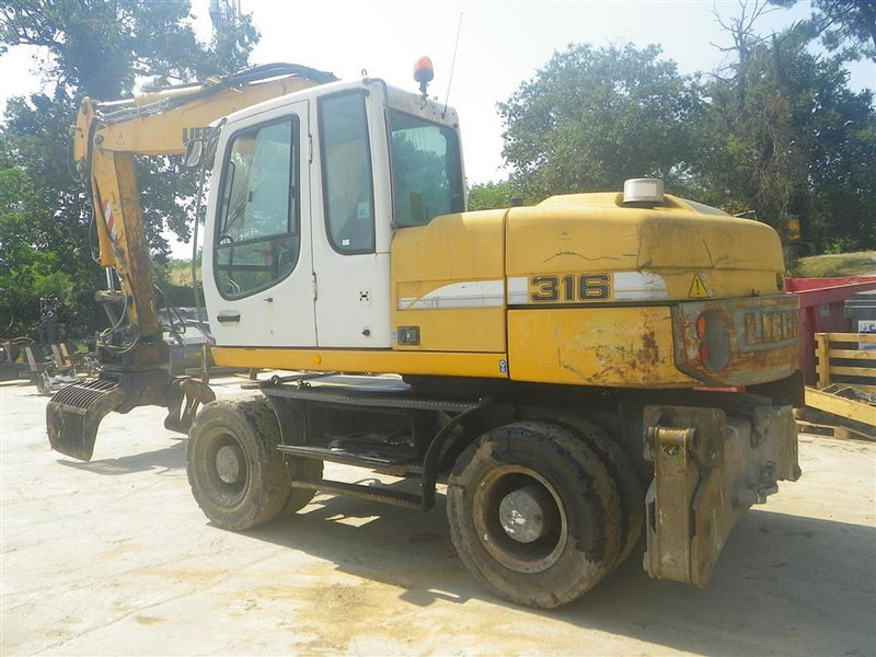 Liebherr A316Li - Kotrógép: 2 kép. Liebherr A316Li - Kotrógép: 2 kép.