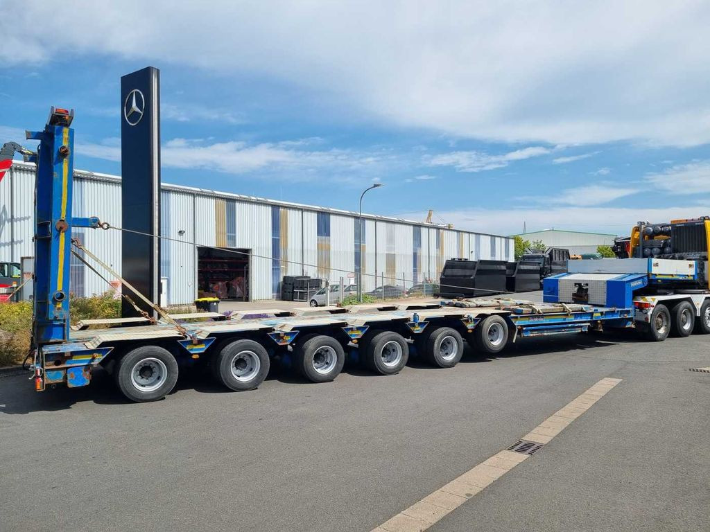 Goldhofer STZ-H6-57/80A Teleskop-Tieflader Waggontransport Goldhofer STZ-H6-57/80A Teleskop-Tieflader Waggontransport - Félpótkocsi mélybölcsős: 5 kép. Goldhofer STZ-H6-57/80A Teleskop-Tieflader Waggontransport Goldhofer STZ-H6-57/80A Teleskop-Tieflader Waggontransport - Félpótkocsi mélybölcsős: 5 kép.