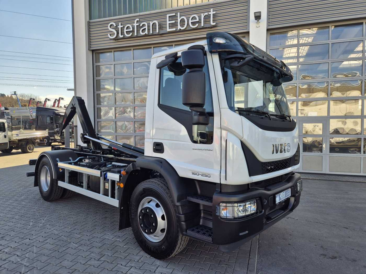 Iveco Eurocargo ML160E25/P HIAB Multilift XR10S4150 - Horgos rakodó teherautó: 1 kép. Iveco Eurocargo ML160E25/P HIAB Multilift XR10S4150 - Horgos rakodó teherautó: 1 kép.
