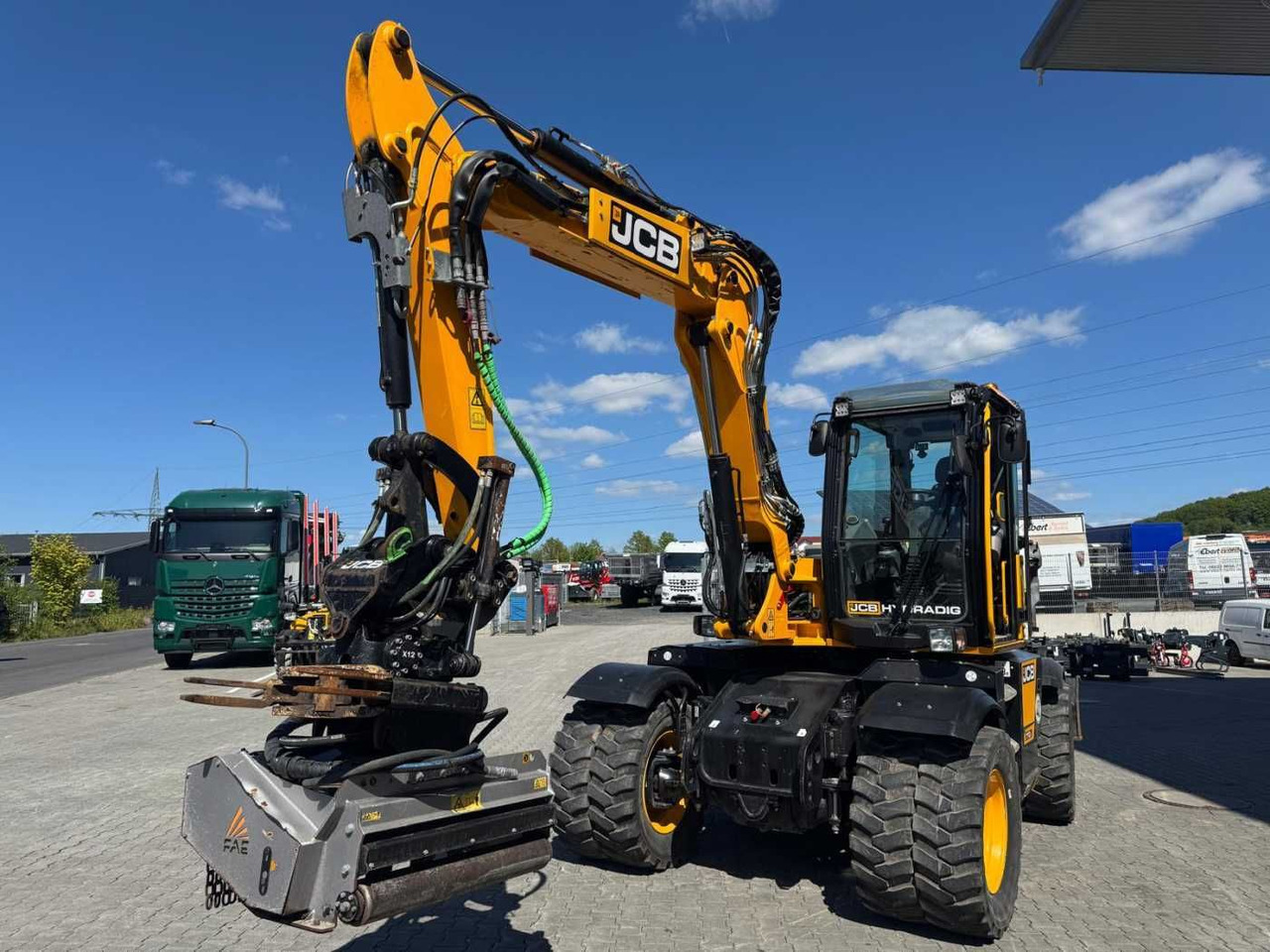 JCB Hydradig HD 110WT / 2021 / 516h! / Tiltrotator - Gumikerekes kotró: 5 kép. JCB Hydradig HD 110WT / 2021 / 516h! / Tiltrotator - Gumikerekes kotró: 5 kép.