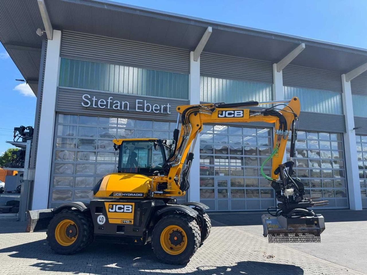 JCB Hydradig HD 110WT / 2021 / 516h! / Tiltrotator - Gumikerekes kotró: 1 kép. JCB Hydradig HD 110WT / 2021 / 516h! / Tiltrotator - Gumikerekes kotró: 1 kép.