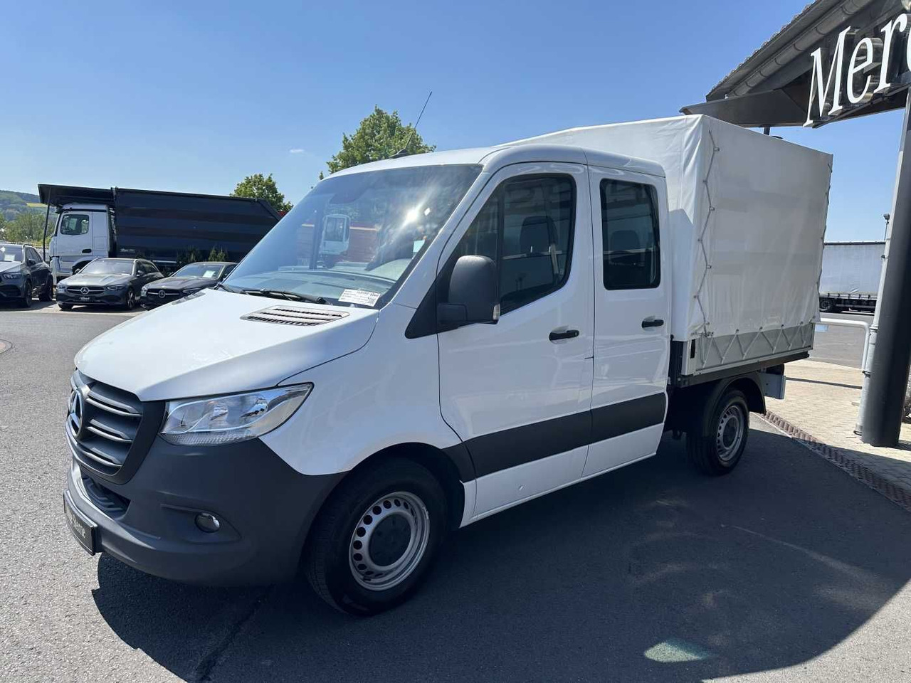 Mercedes-Benz Sprinter 215 CDI DoKa 9G Klima AHK Tempomat SHZ - Platós kisteherautó: 3 kép. Mercedes-Benz Sprinter 215 CDI DoKa 9G Klima AHK Tempomat SHZ - Platós kisteherautó: 3 kép.