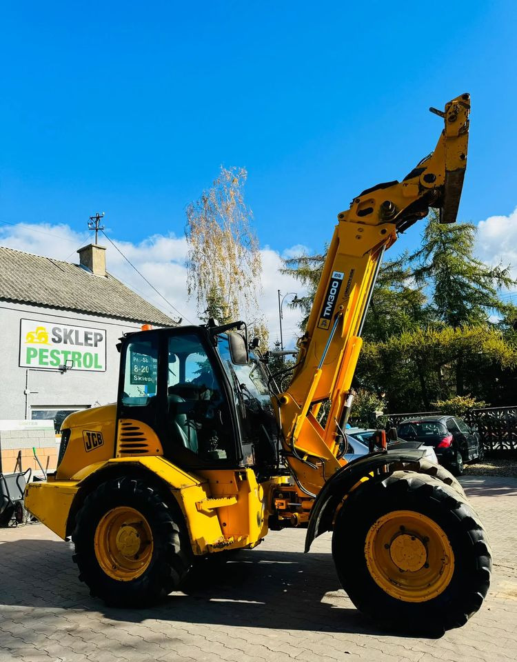 JCB TM300 - Gumikerekes homlokrakodó: 3 kép. JCB TM300 - Gumikerekes homlokrakodó: 3 kép.