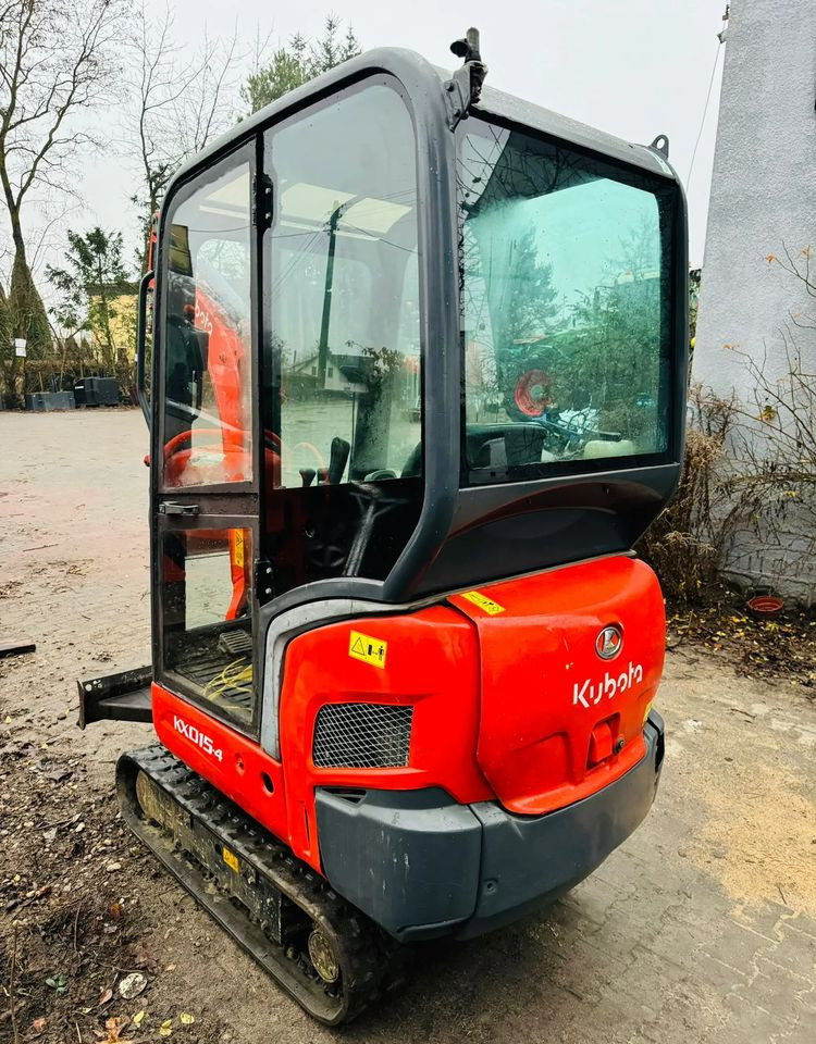 Kubota KX015-4 - Minikotró: 3 kép. Kubota KX015-4 - Minikotró: 3 kép.