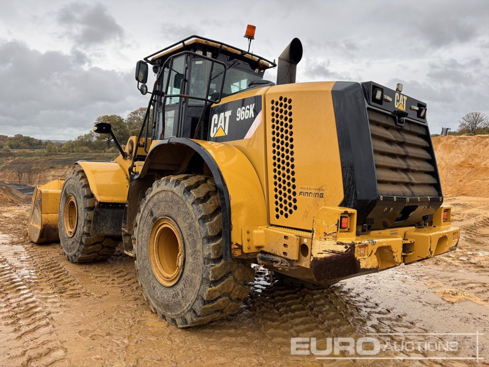 2012 CAT 966K - Gumikerekes homlokrakodó: 3 kép. 2012 CAT 966K - Gumikerekes homlokrakodó: 3 kép.