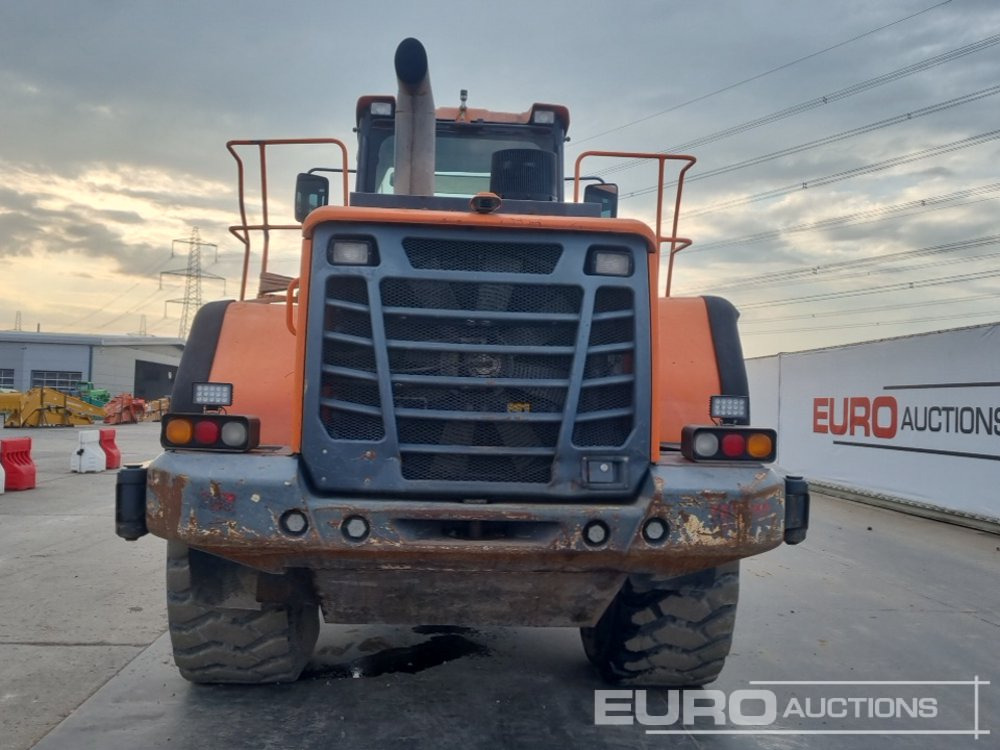 2014 Doosan DL420-3 - Gumikerekes homlokrakodó: 4 kép. 2014 Doosan DL420-3 - Gumikerekes homlokrakodó: 4 kép.