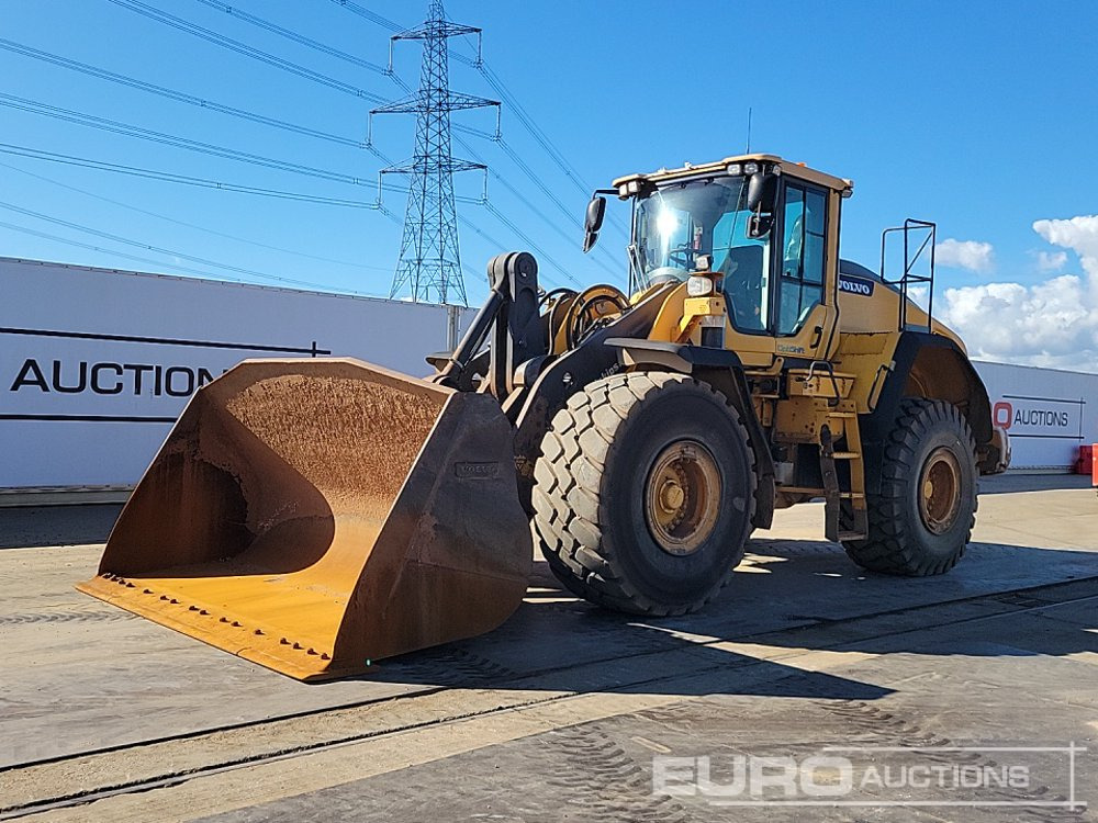 2014 Volvo L150H - Gumikerekes homlokrakodó: 1 kép. 2014 Volvo L150H - Gumikerekes homlokrakodó: 1 kép.