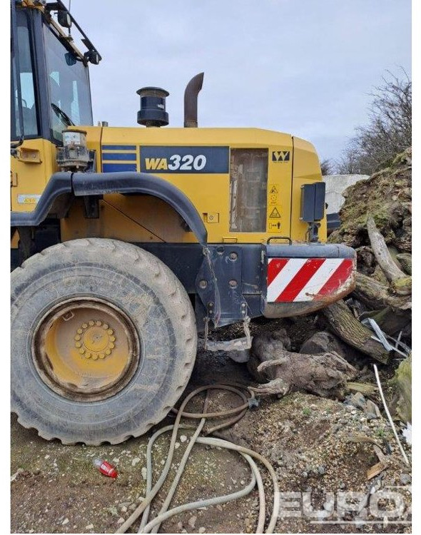 2015 Komatsu WA320-7 - Gumikerekes homlokrakodó: 4 kép. 2015 Komatsu WA320-7 - Gumikerekes homlokrakodó: 4 kép.