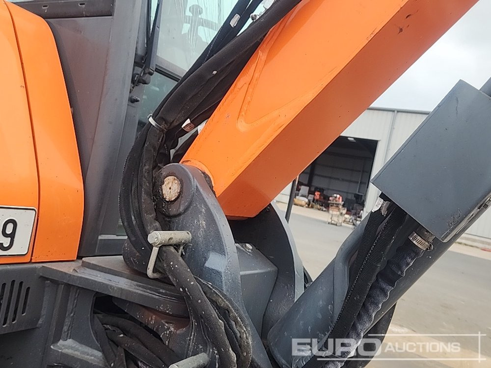 Gumikerekes kotró 2017 Doosan DX57W-5: 27 kép.