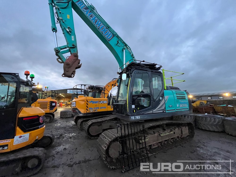 2021 Kobelco SK210LC-11 - Lánctalpas kotró: 1 kép. 2021 Kobelco SK210LC-11 - Lánctalpas kotró: 1 kép.