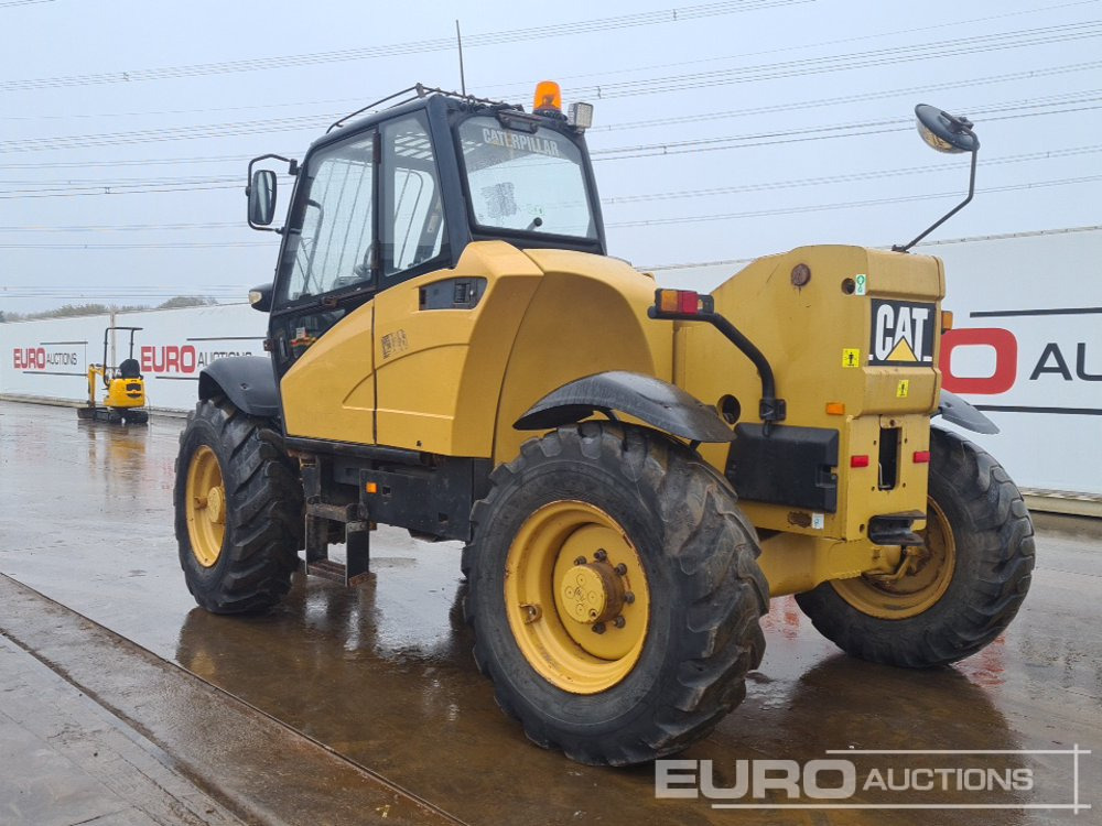 CAT TH340B - Teleszkópos rakodó: 3 kép. CAT TH340B - Teleszkópos rakodó: 3 kép.