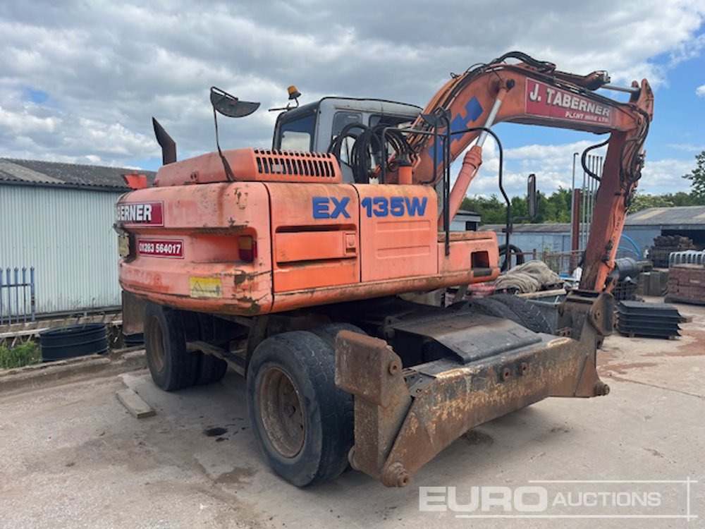 Fiat Hitachi EX135W - Gumikerekes kotró: 2 kép. Fiat Hitachi EX135W - Gumikerekes kotró: 2 kép.