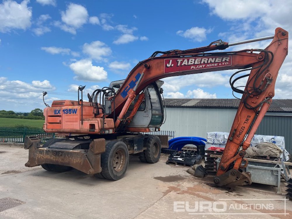 Fiat Hitachi EX135W - Gumikerekes kotró: 1 kép. Fiat Hitachi EX135W - Gumikerekes kotró: 1 kép.