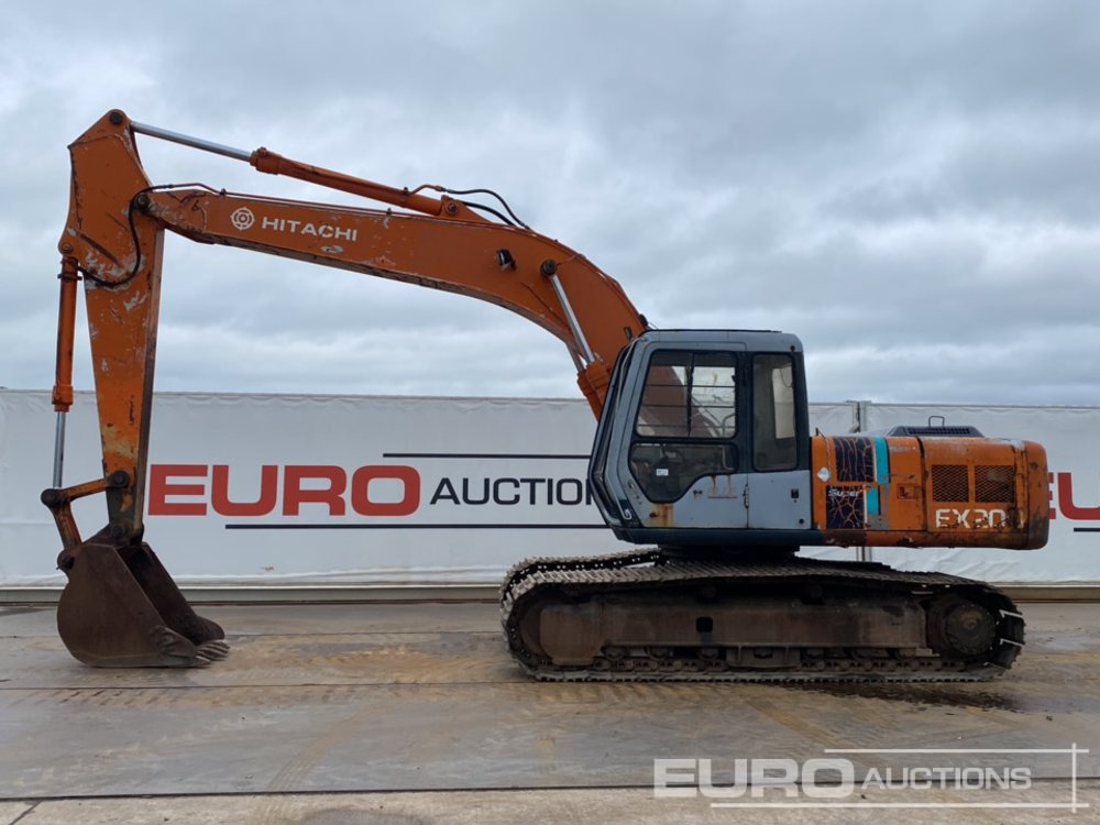 Hitachi EX200 - Lánctalpas kotró: 2 kép. Hitachi EX200 - Lánctalpas kotró: 2 kép.