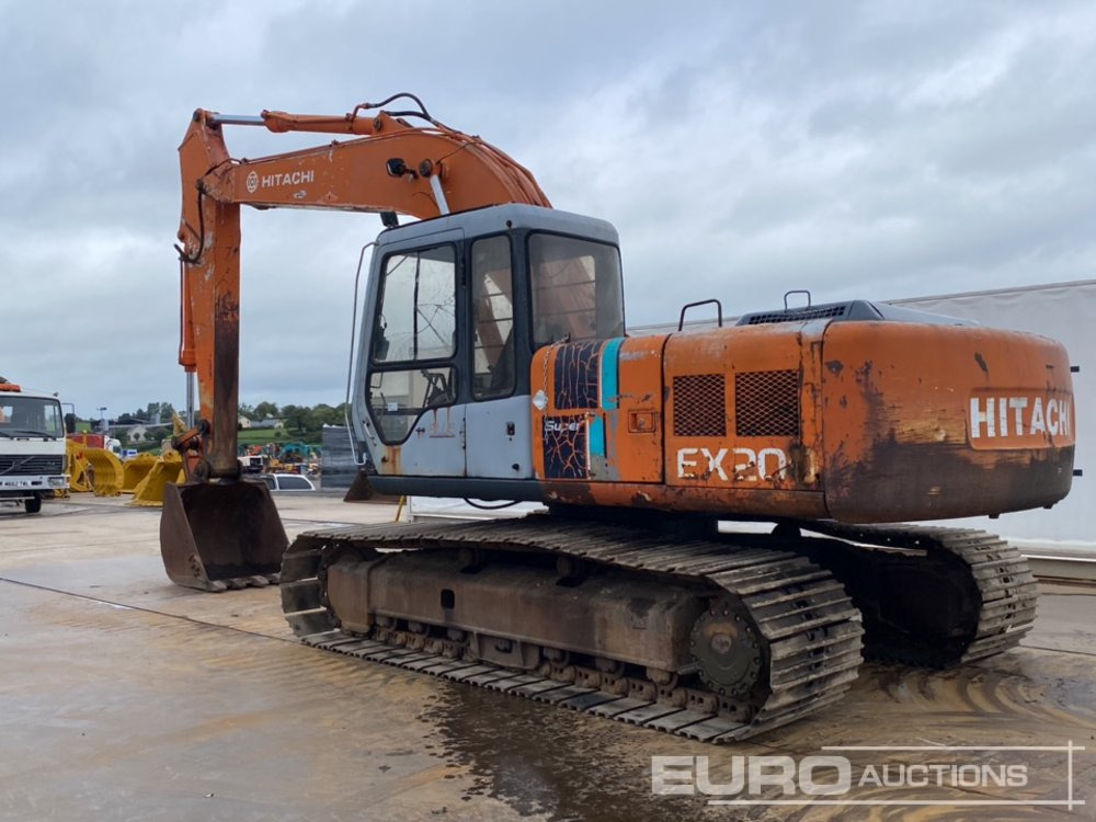 Hitachi EX200 - Lánctalpas kotró: 3 kép. Hitachi EX200 - Lánctalpas kotró: 3 kép.