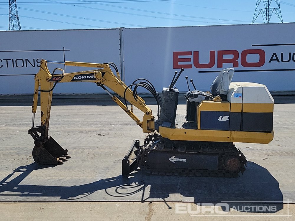 Komatsu PC05-5 - Minikotró: 2 kép. Komatsu PC05-5 - Minikotró: 2 kép.