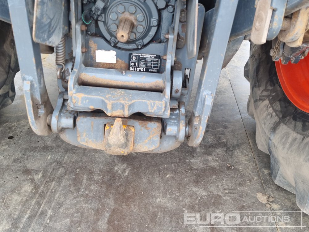 Traktor Kubota M7171: 18 kép.