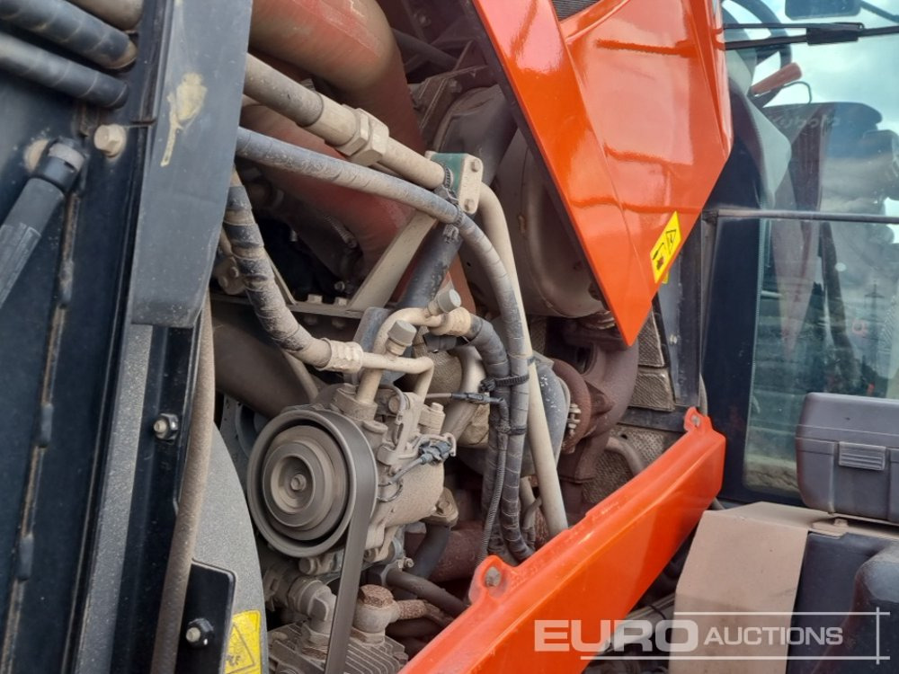 Traktor Kubota M7171: 23 kép.
