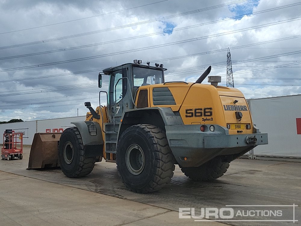Liebherr L566 - Gumikerekes homlokrakodó: 3 kép. Liebherr L566 - Gumikerekes homlokrakodó: 3 kép.