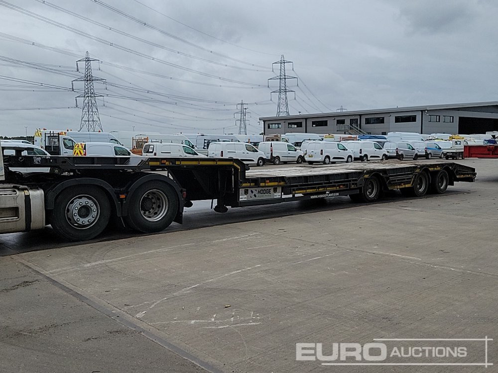 Montracon Tri Axle Step Frame Low Loader Trailer - Félpótkocsi mélybölcsős: 1 kép. Montracon Tri Axle Step Frame Low Loader Trailer - Félpótkocsi mélybölcsős: 1 kép.