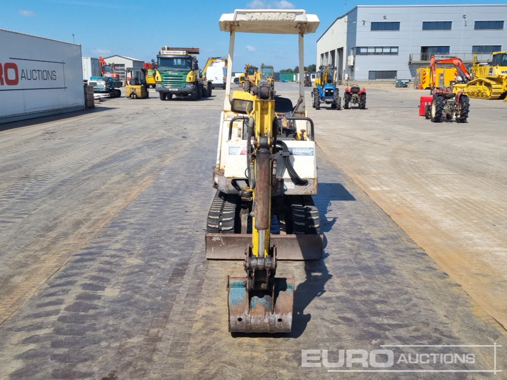 Minikotró Yanmar B12-1: 8 kép.
