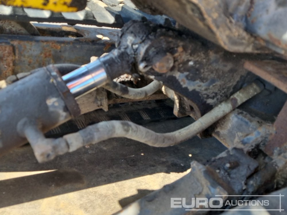 Minikotró Yanmar B12-1: 26 kép.