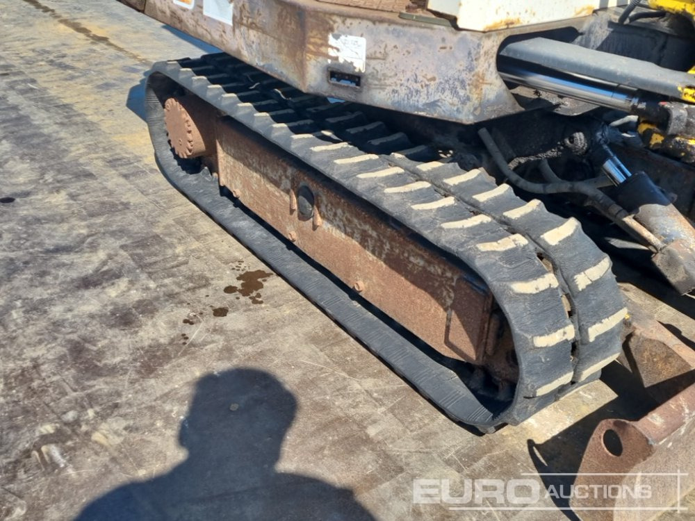 Minikotró Yanmar B12-1: 16 kép.