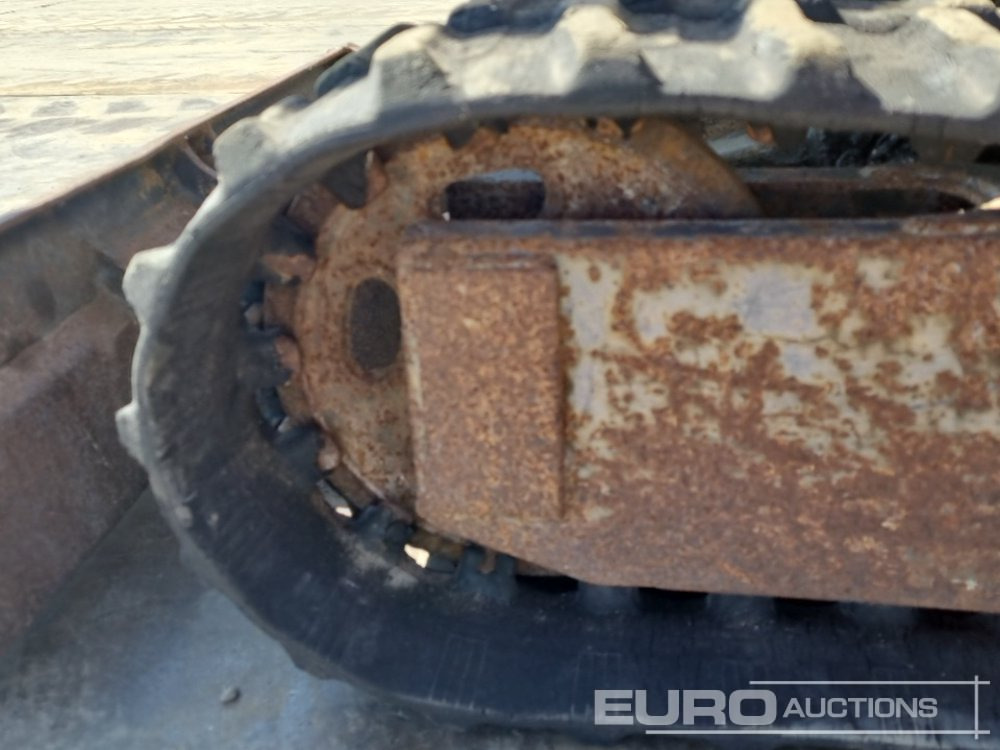 Minikotró Yanmar B12-1: 10 kép.