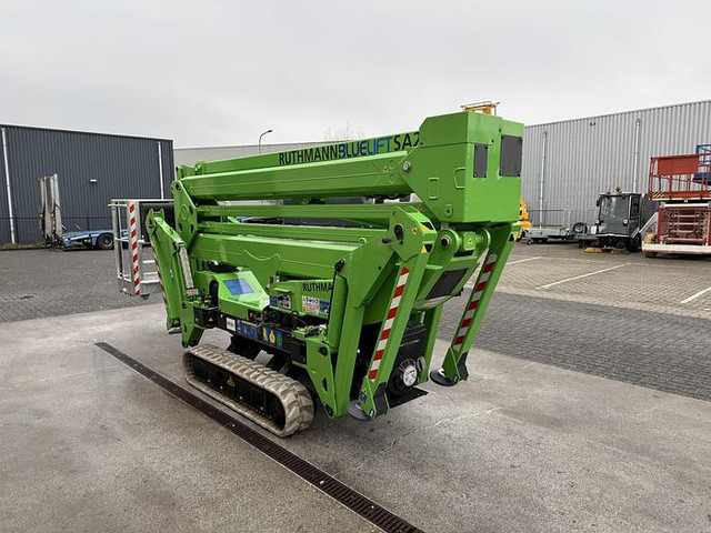 Ruthmann Bluelift SA22, Spin hoogwerker, 22 meter - Gumilánctalpas személyemelő: 4 kép. Ruthmann Bluelift SA22, Spin hoogwerker, 22 meter - Gumilánctalpas személyemelő: 4 kép.