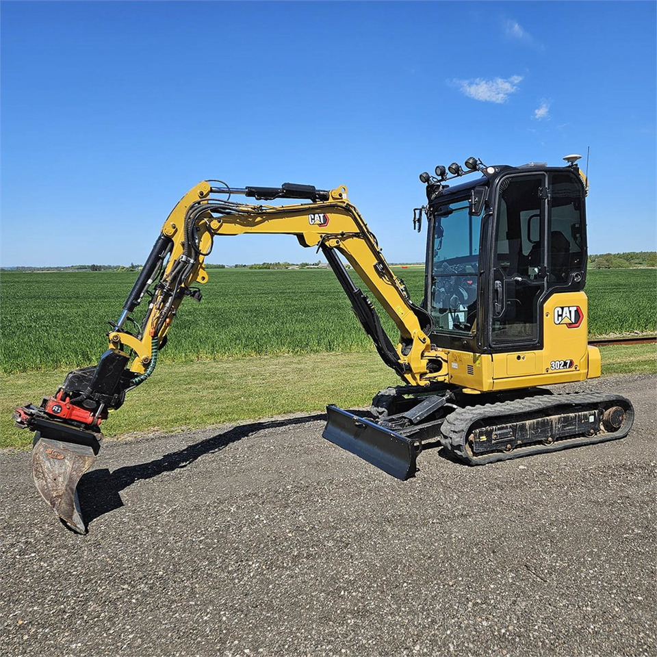 Caterpillar 302.7 CR - Minikotró: 2 kép. Caterpillar 302.7 CR - Minikotró: 2 kép.