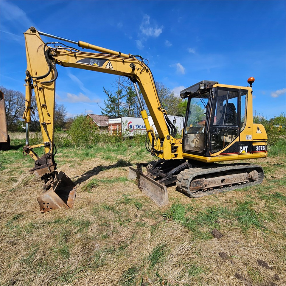 Caterpillar 307 B - Minikotró: 2 kép. Caterpillar 307 B - Minikotró: 2 kép.