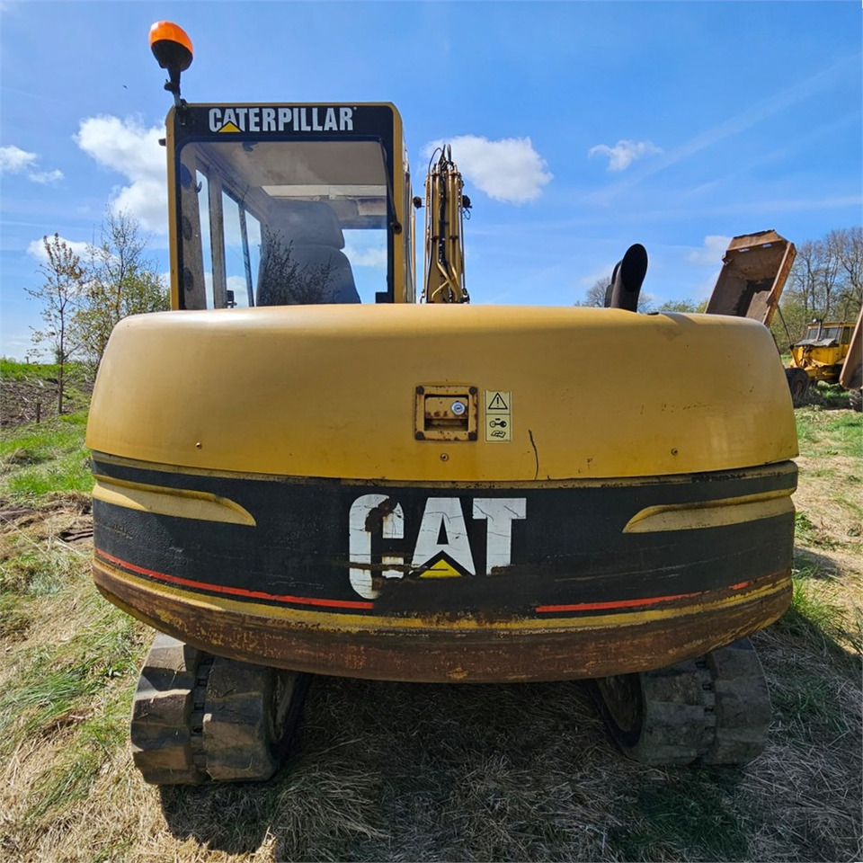 Caterpillar 307 B - Minikotró: 4 kép. Caterpillar 307 B - Minikotró: 4 kép.