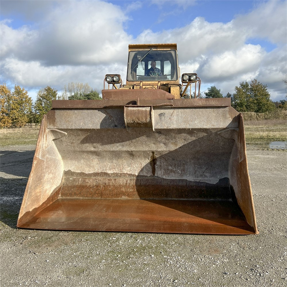 Dresser 560 B - Gumikerekes homlokrakodó: 4 kép. Dresser 560 B - Gumikerekes homlokrakodó: 4 kép.