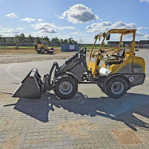 Eurotrack W12 MS-2 - Gumikerekes homlokrakodó: 5 kép. Eurotrack W12 MS-2 - Gumikerekes homlokrakodó: 5 kép.