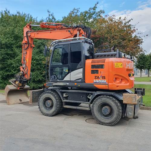 Hitachi ZX145 WT-6 - Gumikerekes kotró: 1 kép. Hitachi ZX145 WT-6 - Gumikerekes kotró: 1 kép.