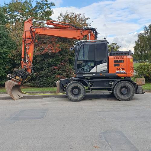 Hitachi ZX145 WT-6 - Gumikerekes kotró: 3 kép. Hitachi ZX145 WT-6 - Gumikerekes kotró: 3 kép.