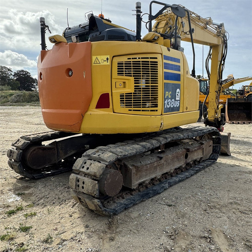 Komatsu PC138US - Lánctalpas kotró: 4 kép. Komatsu PC138US - Lánctalpas kotró: 4 kép.